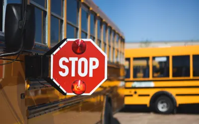 School bus with stop arm extended